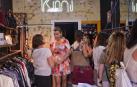 kmi moda Paola Casas, segunda por la izquierda, el 13 de mayo durante la inauguración de KMI, en la calle Iturrama