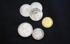 Hallan monedas antiguas entre las hojas de un proceso judicial de 1876