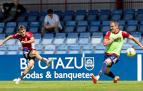 Aimar Oroz y Kike García durante el entrenamiento de este jueves en Tajonar