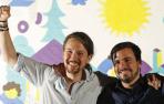 El candidato de Unidos Podemos a la Presidencia del Gobierno, Pablo Iglesias, y el coordinador de IU, Alberto Garzón (d).