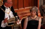 May acusa a Putin de "entrometerse y apoyar ataques cibernéticos"
