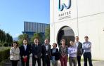 Cristina Gómez, directora del instituto de investigación INAMAT; Ramón Gonzalo, rector de la UPNA; Txus Pintor, director científico tecnológico de NAITEC; Manu Ayerdi, consejero de Desarrollo Económico; Estibalitz Erauzquin, directora general de NAITEC; Ana Burusco, directora general de universidad del Gobierno de Navarra; Francisco Javier Arregui, vicerrector de investigación; Iosu García, director del servicio de investigación; y Antonio López, director de área del vicerrectorado de investigación.