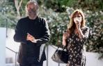 El cantante Joan Manel Serrat , acompañado de su pareja Candela Tiffón, sale de capilla ardiente del escritor Juan Marsé.