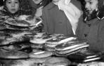 Los roscos de San Blas y la mirada dulce de las niñas