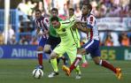 Messi, junto a Mario Suárez.