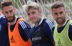 Brandon, entre Torres y Rober Ibáñez en la sesión del sábado.