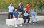 Equipo de I+D+i de Tracasa Instrumental con el podio de la competición