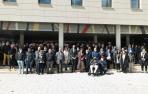 Autoridades, galardonados y representantes y usuarios de Adisco, ante el centro cultural de Corella, donde se celebró el acto institucional de los 25 años del centro especial de empleo.