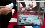 Una urna con varios votos en las elecciones francesas