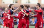 Roberto Torres, Pablo Ibáñez y Kike García rodean a Nacho Vidal tras su gol en Fuentes de Ebro
