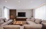 Salón diseñado por inHAUS para una de sus casas prefabricadas
