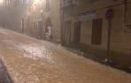 Una fuerte tormenta convierte en ríos las calles de Artajona en plenas fiestas