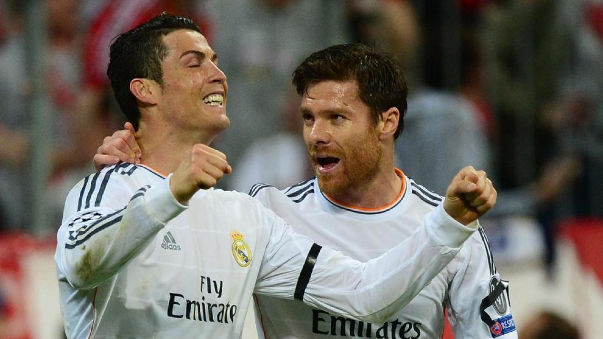 Xabi Alonso, junto a Cristiano en el partido ante el Bayern
