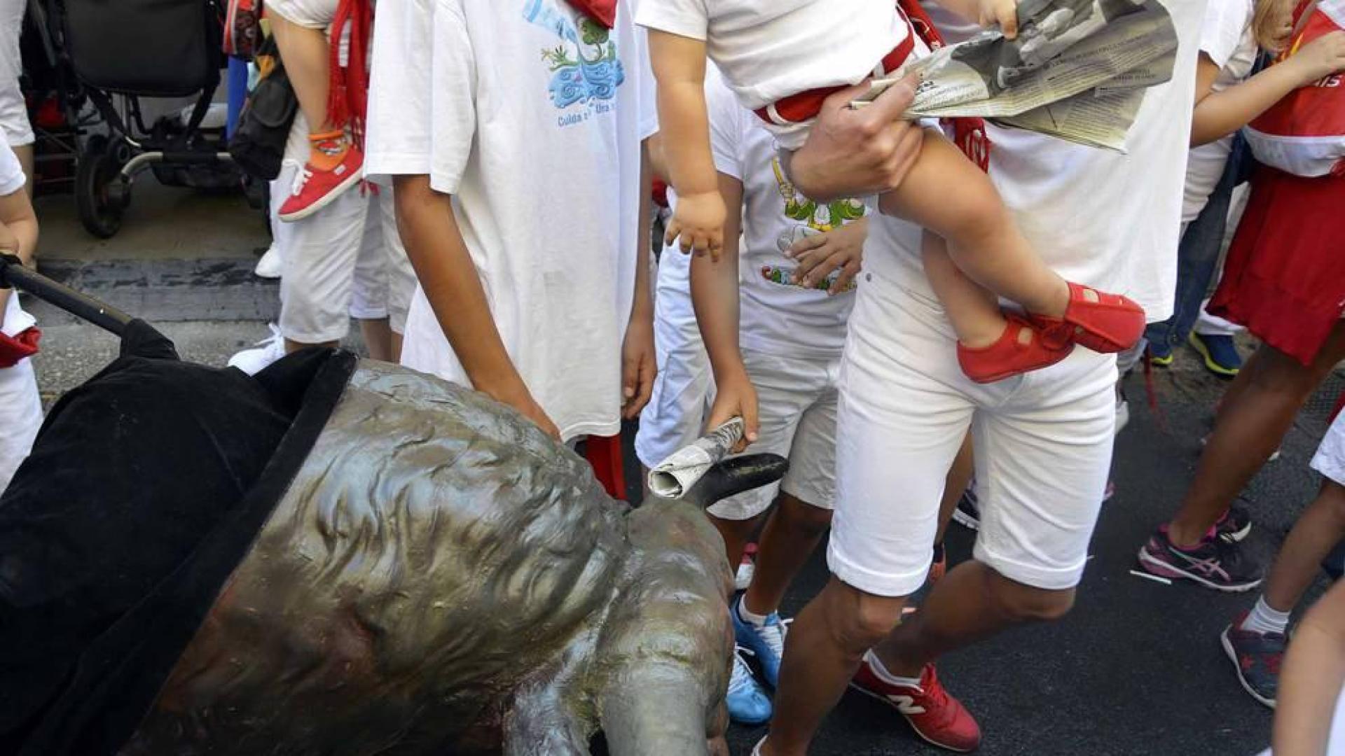Imágenes del encierro txiki del día 13 de San Fermín