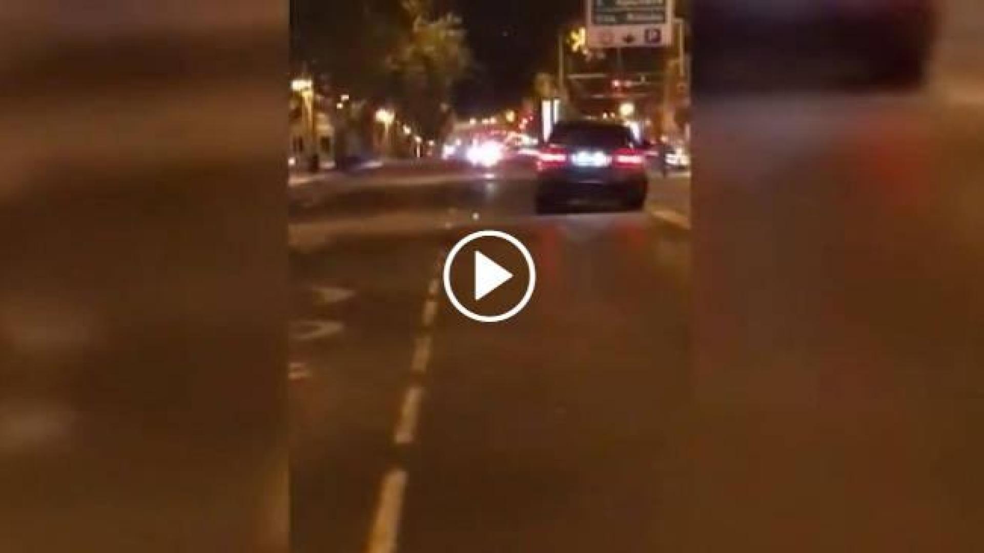 Buscan a un conductor grabado intentando atropellar a un hombre en Madrid