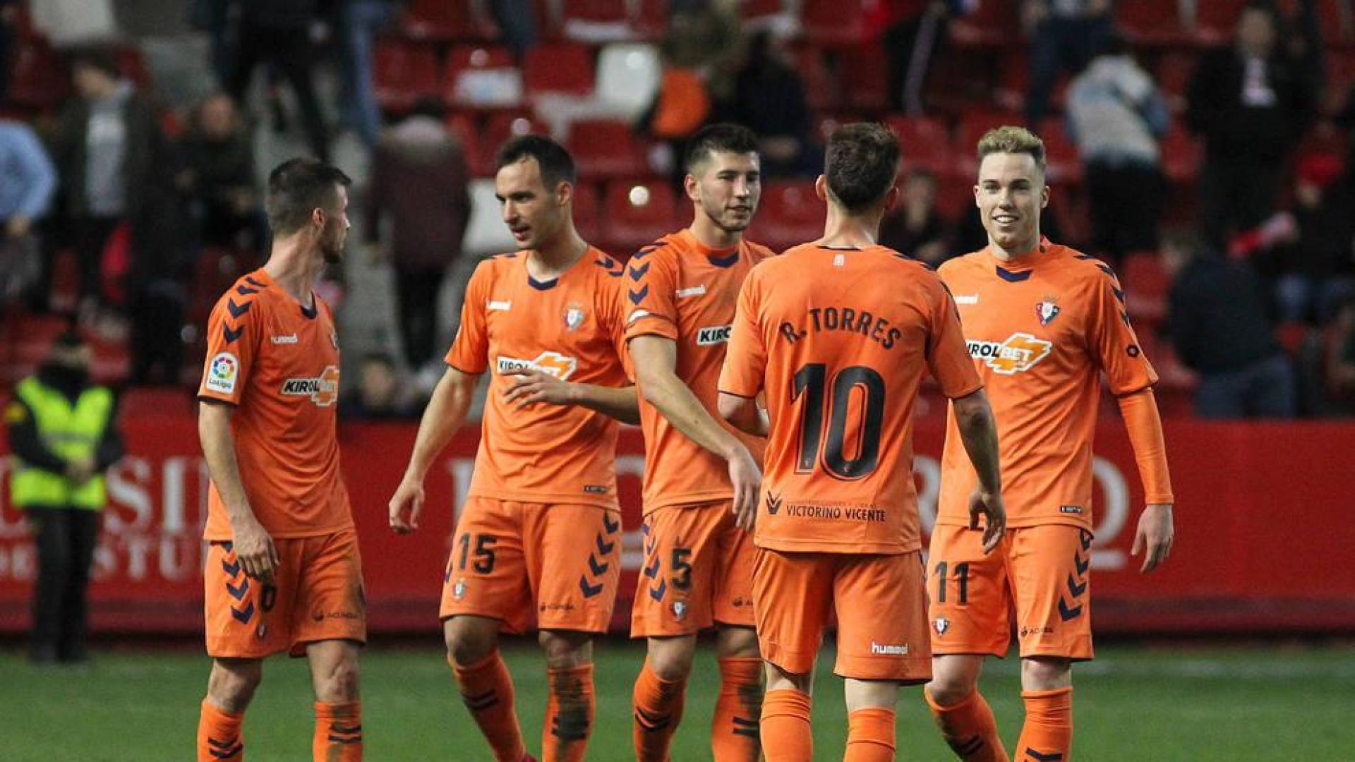 David, junto a sus compañeros, tras la victoria ante el Sporting.