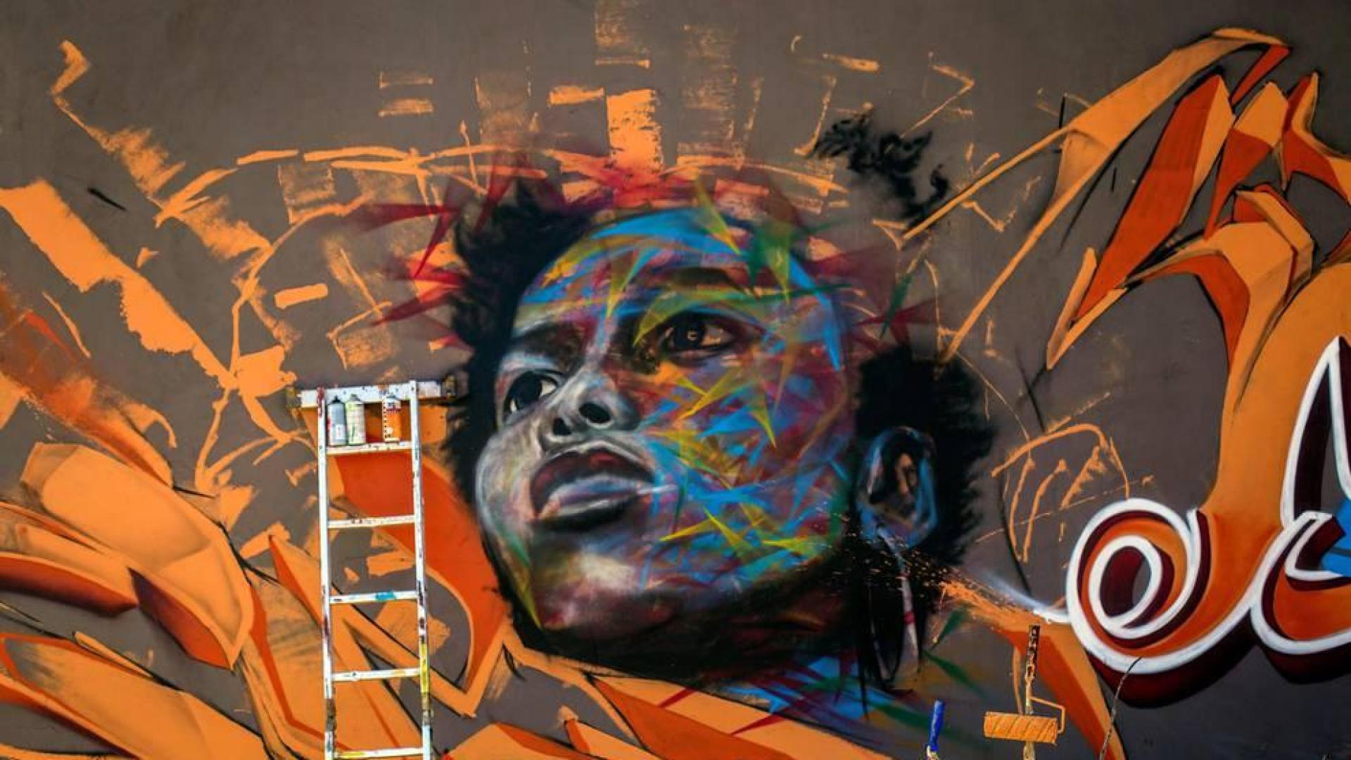Los artistas decoran los muros de la capital senegalesa en la décima edición del festival de arte urbano