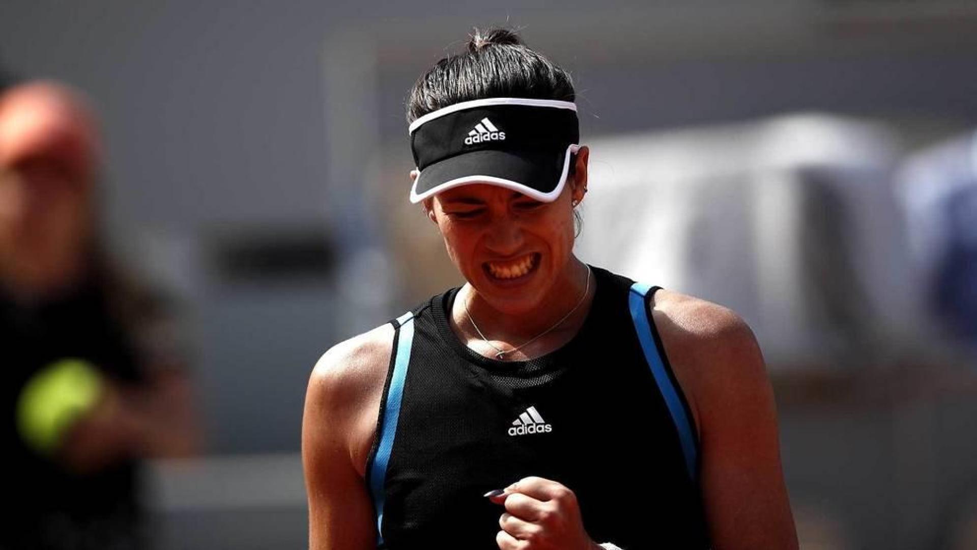 Garbiñe Muguruza celebra su victoria ante la ucraniana Elina Svitolina.