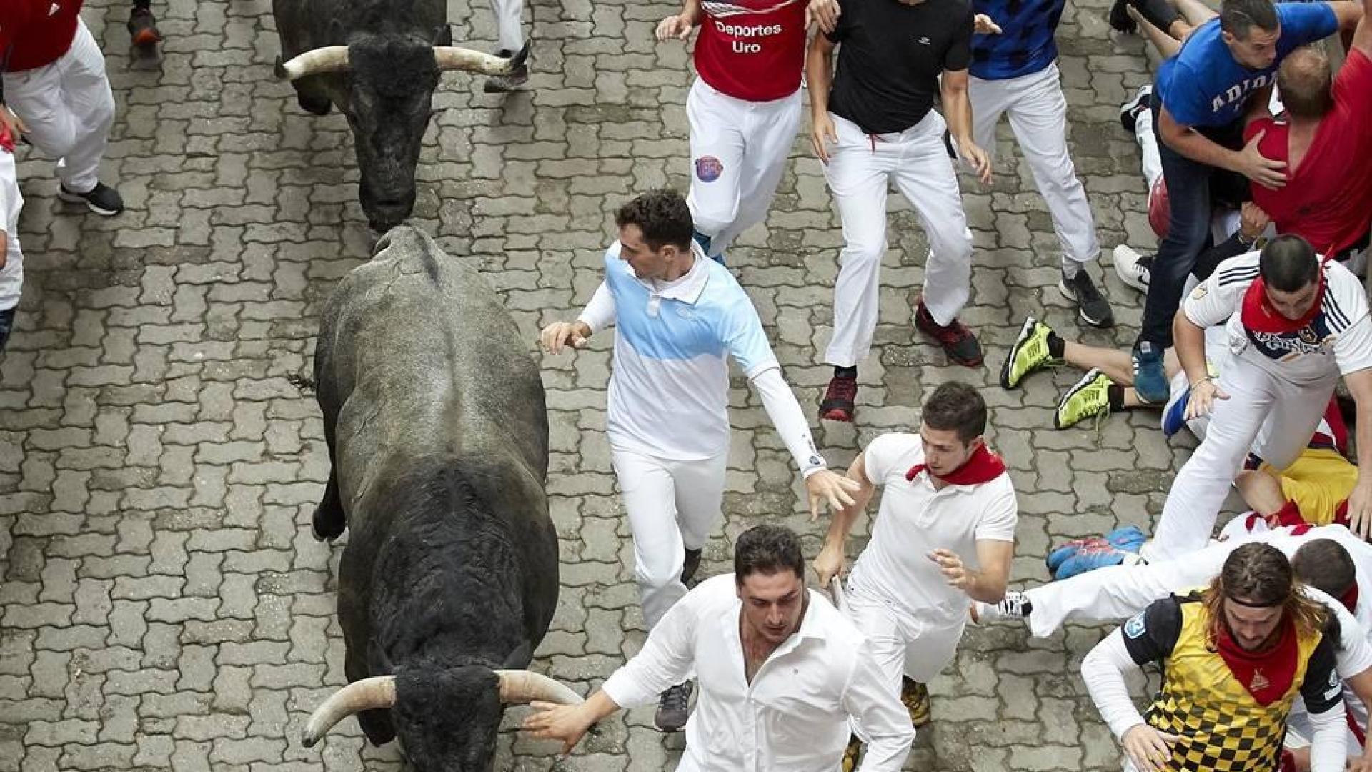 Fotos exclusivas del tercer encierro de San Fermín 2019 de los fotógrafos de Diario de Navarra.