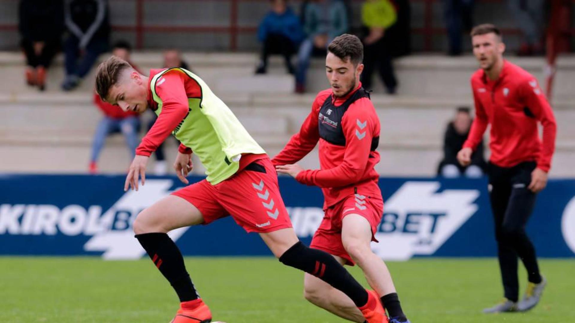 Miguel Olavide junto a José Hualde en un entrenamiento de esta pasada temporada.