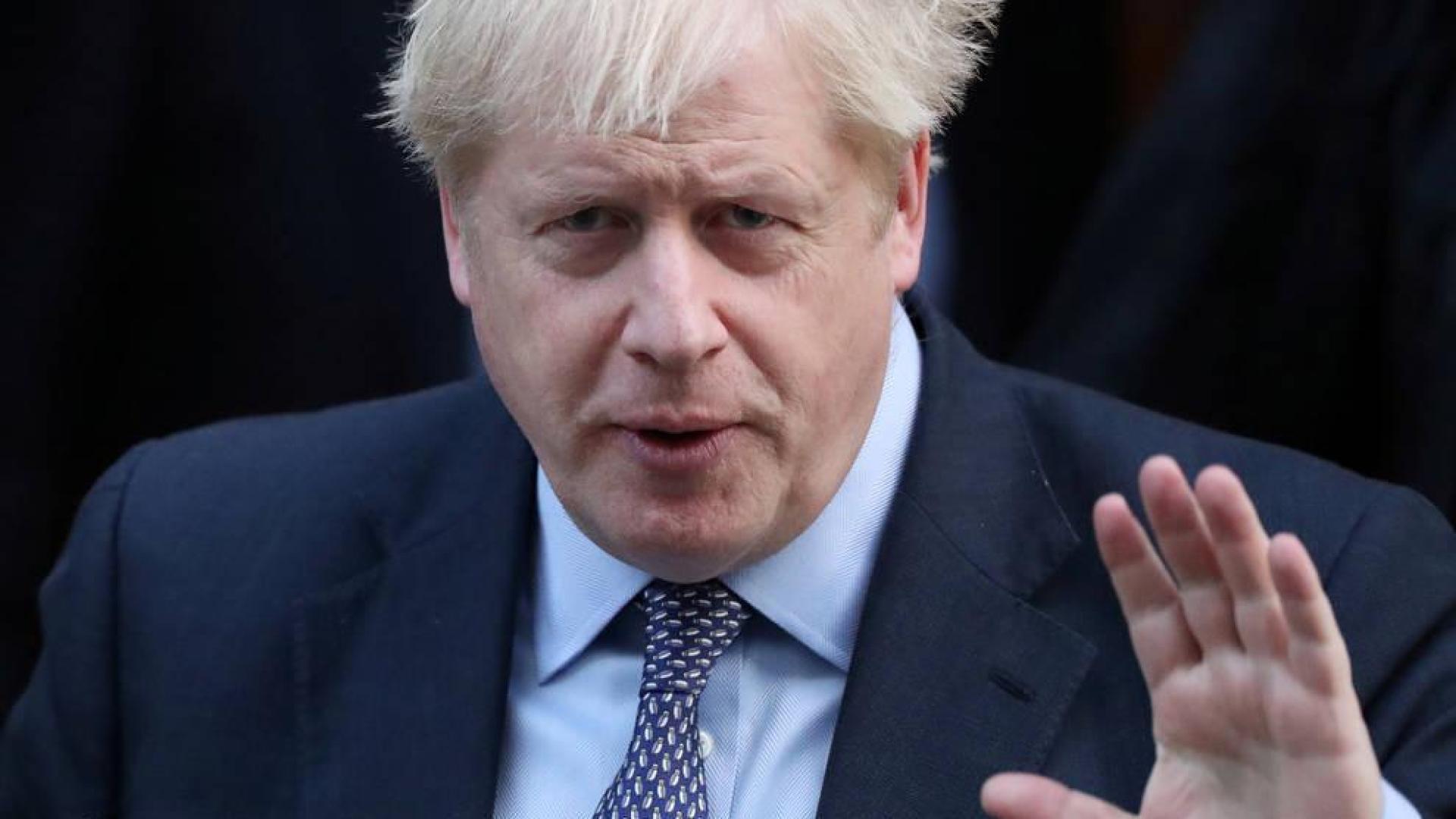 Boris Johnson, antes de dirigirse al Parlamento británico.