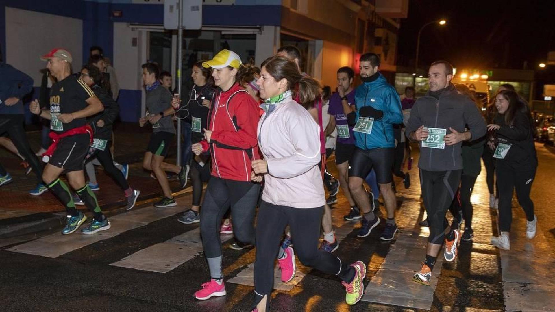 Participantes en la carrera disputada el viernes, 22 de noviembre, por Pamplona sobre una distancia de 5,6 kilómetros.