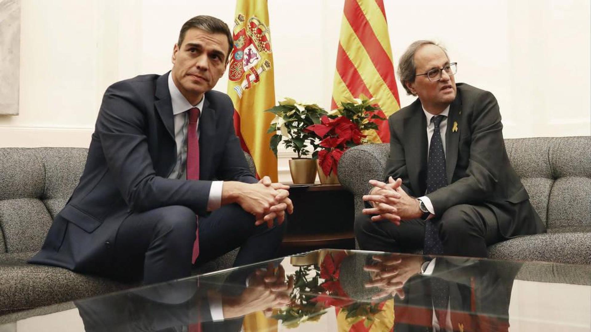 El presidente del Gobierno, Pedro Sánchez, y el de la Generalitat, Quim Torra, durante una reunión que mantuvieron en el Palau de Pedralbes de Barcelona.