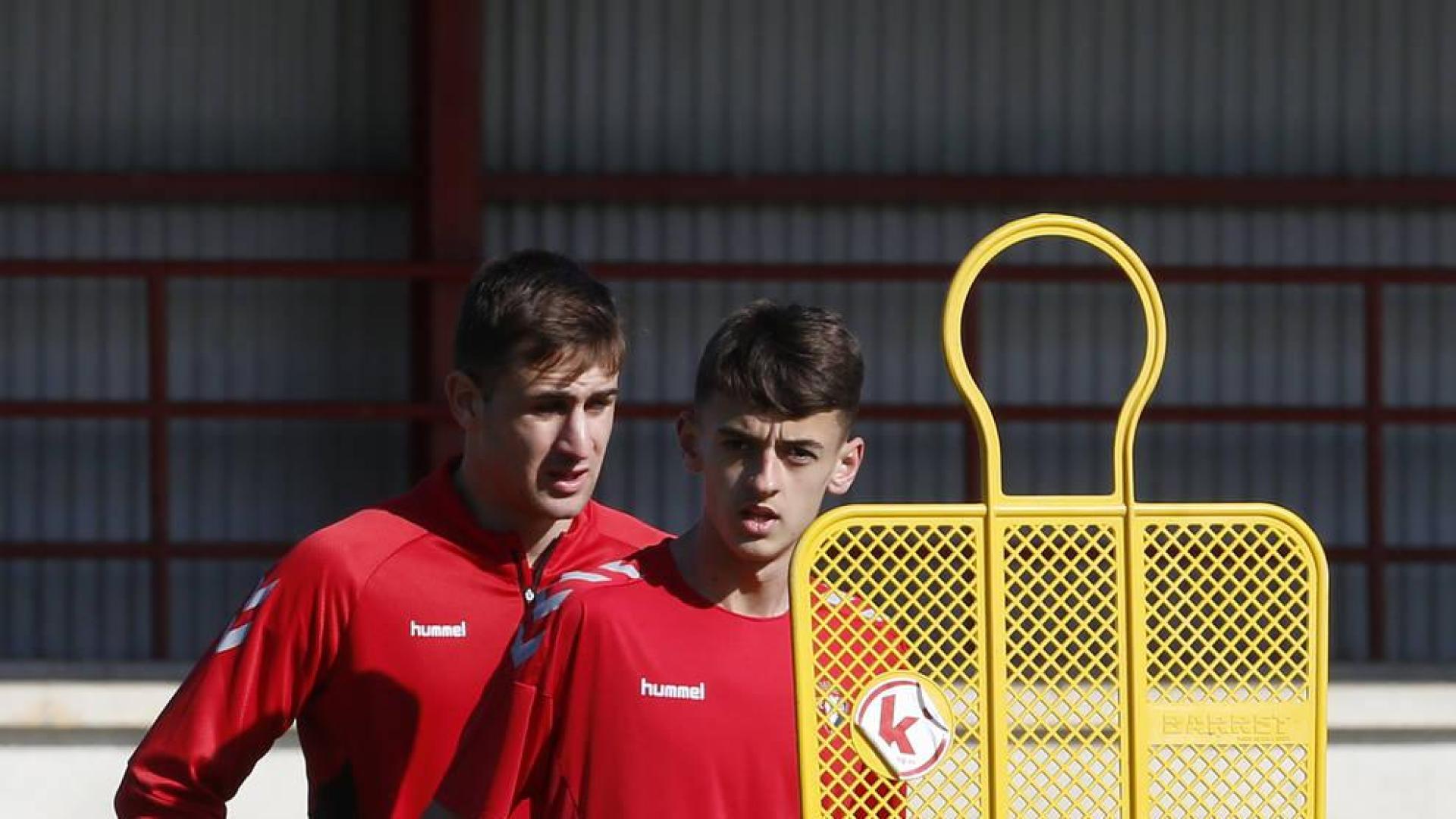 Aimar Oroz (en primer plano) e Iván Martínez 'Barbero', en la sesión de este viernes.