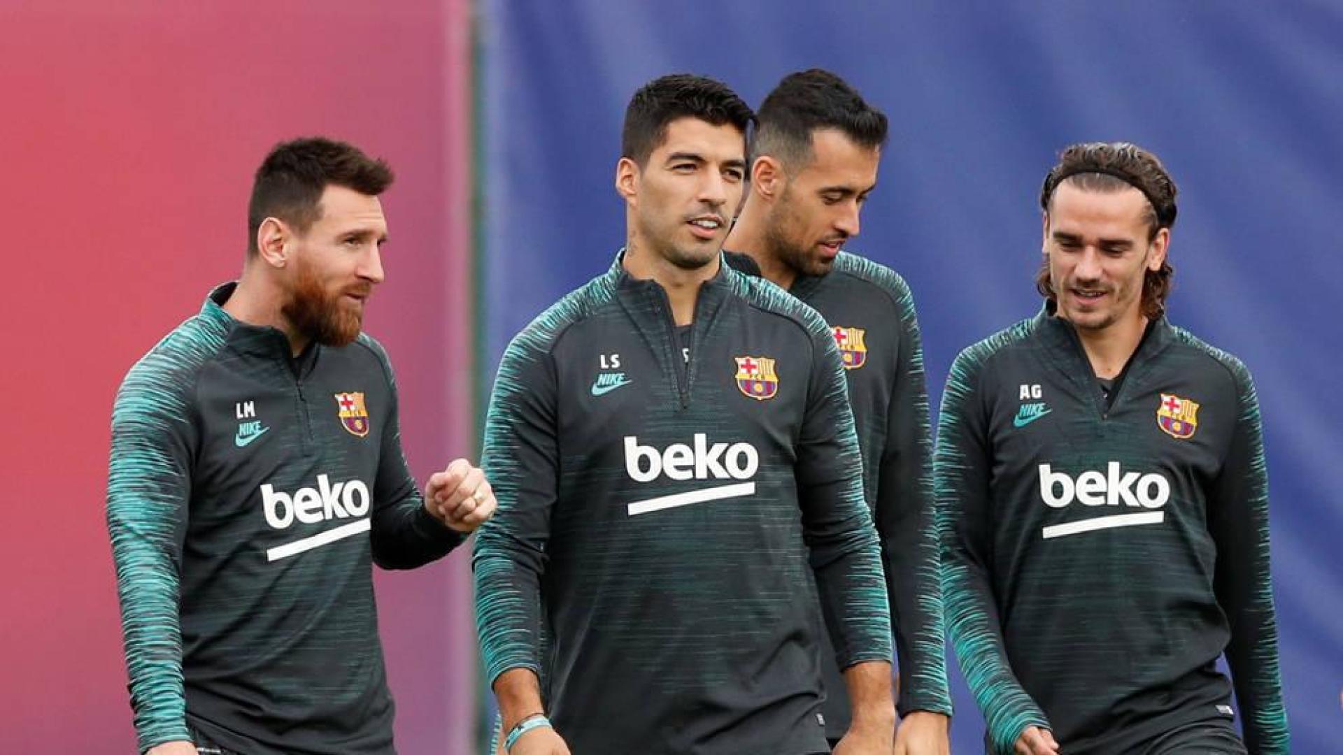 El tridente del Barcelona, Messi, Suárez y Griezman, en un entrenamiento previo al partido de Champions