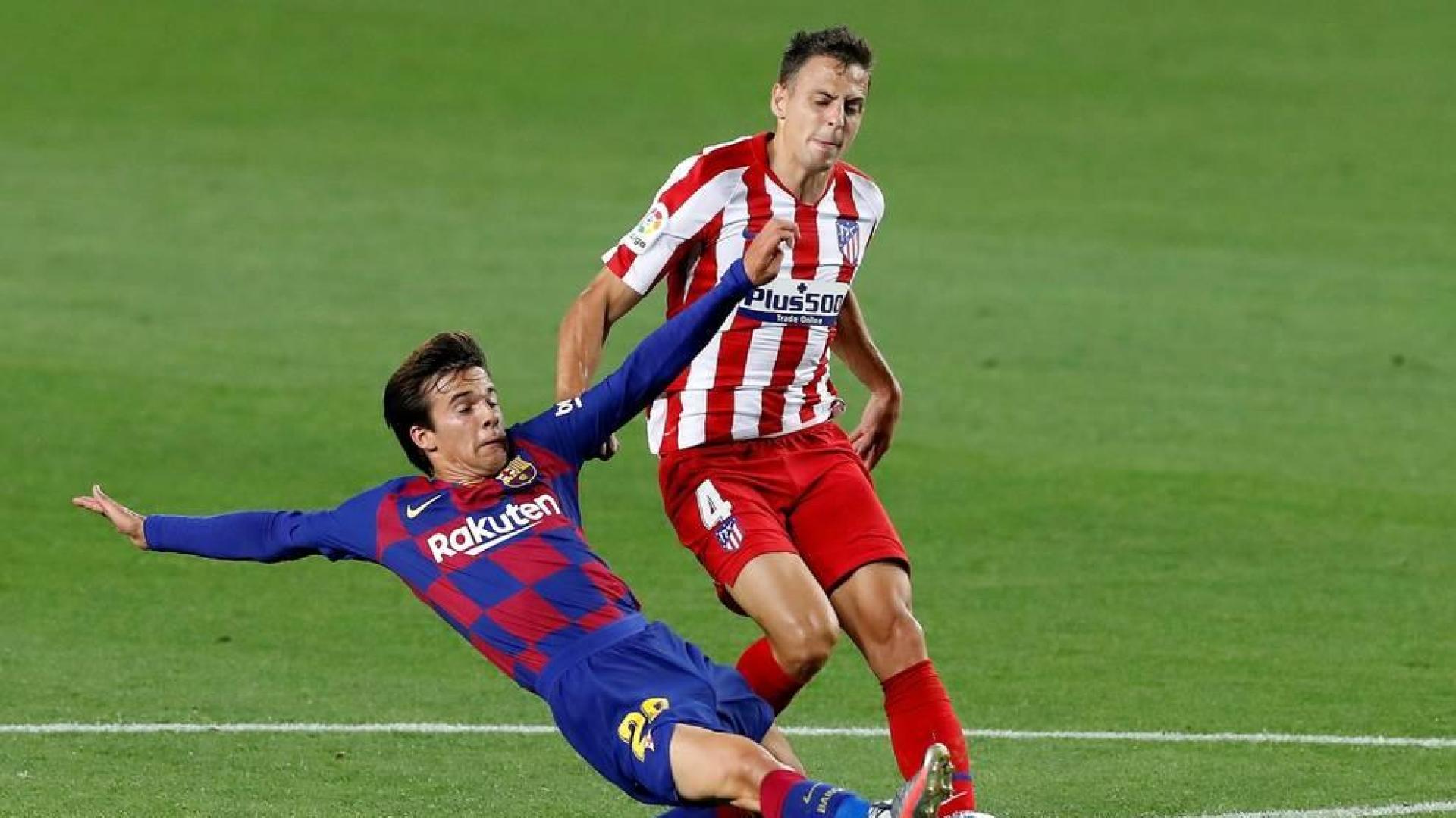 Riqui Puig y Santiago Arias.