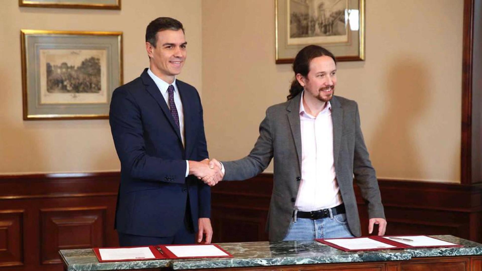 Sánchez e Iglesias firman un preacuerdo para un Gobierno de coalición