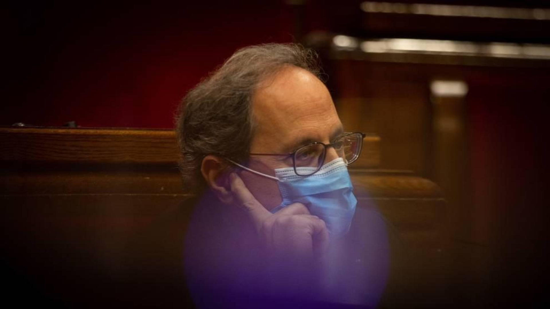 El presidente de la Generalitat, Quim Torra, durante el inicio de la sesión del pleno extraordinario del Parlamento de Cataluña.