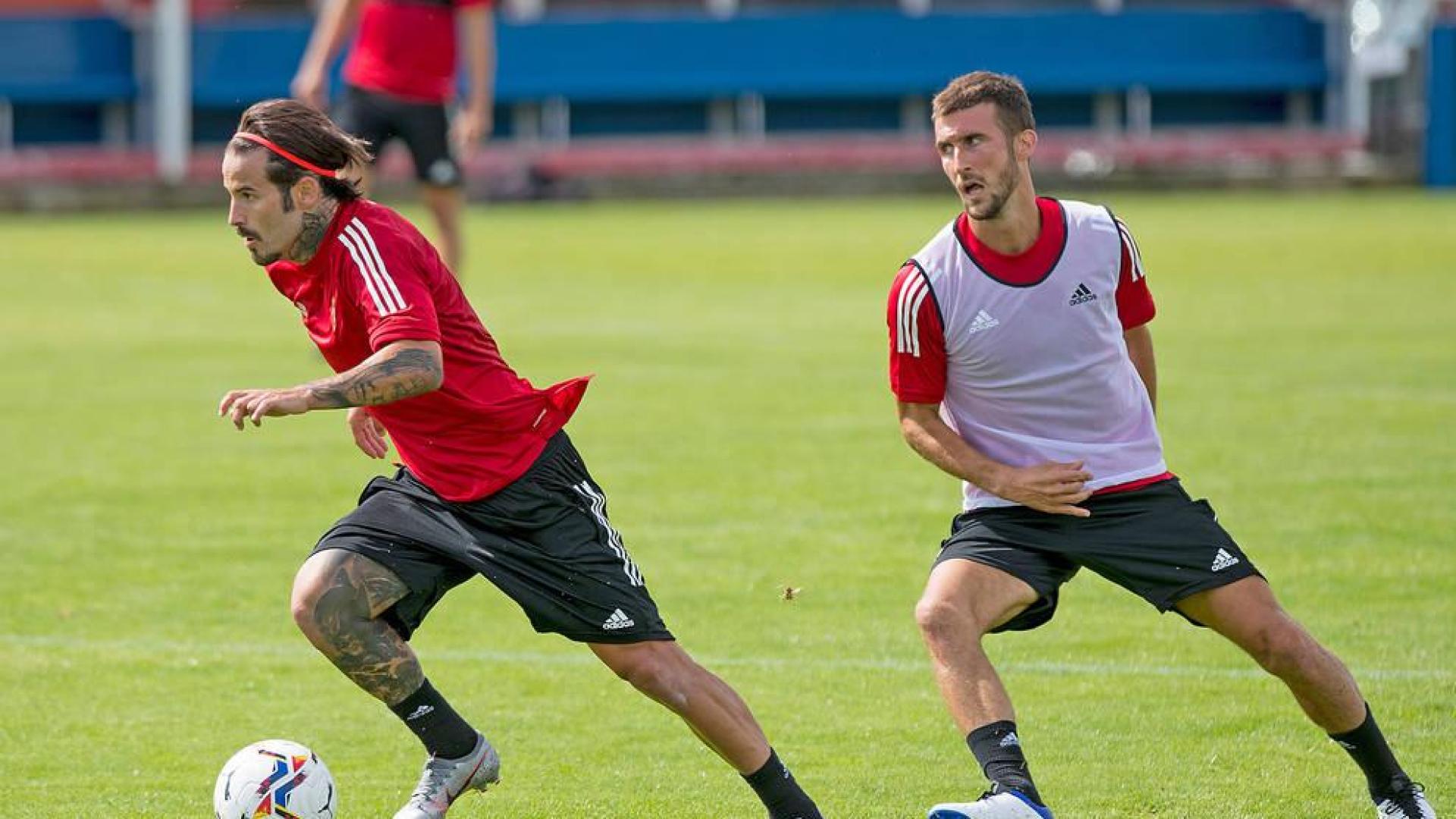 Oier, con Rubén, en un entrenamiento.