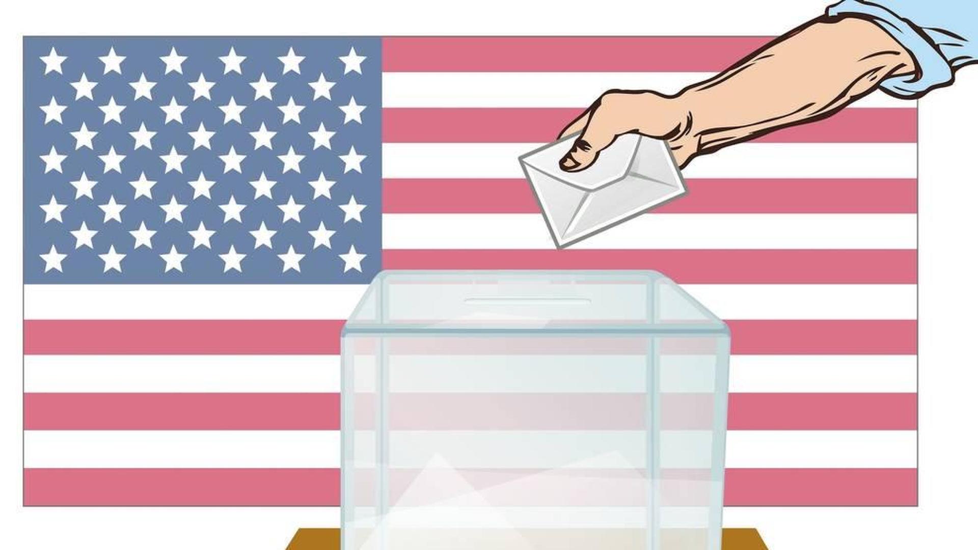 Imagen de una mano introduciendo una papeleta en una urna electoral