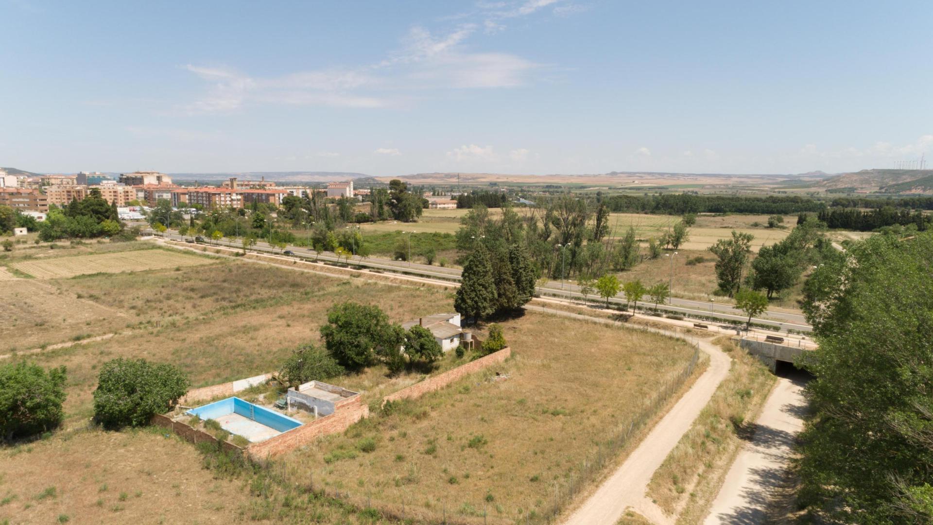 Imagen de terrenos donde se construirá el nuevo barrio, en la salida a Fontellas y hasta la Vía Verde del Tarazonica, en la parte inferior derecha de la imagen