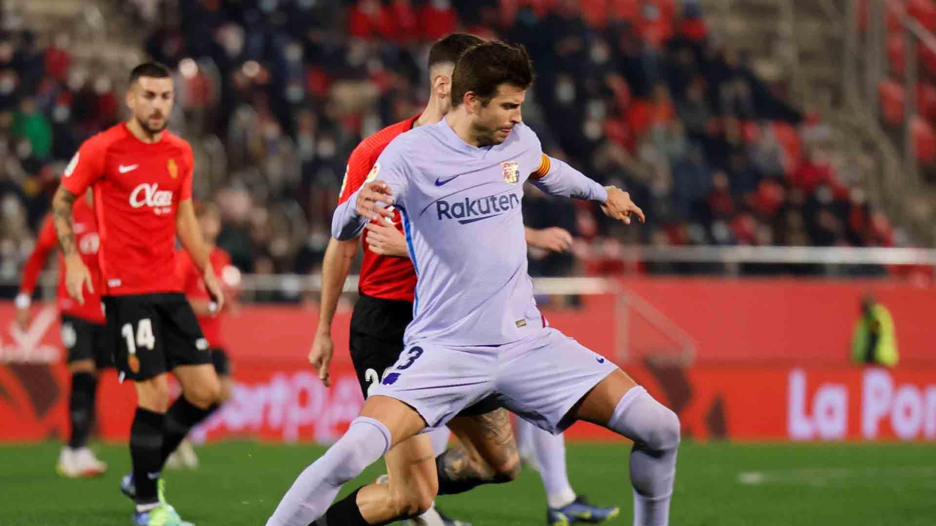 Gerard Piqué, en una acción del partido de Liga del Barcelona ante el Mallorca