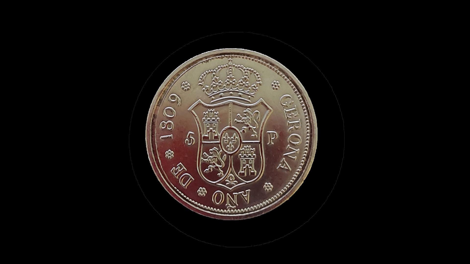 Reverso de una réplica de la moneda de 5 pesetas cuyo original alcanza los 27.000 euros en subasta