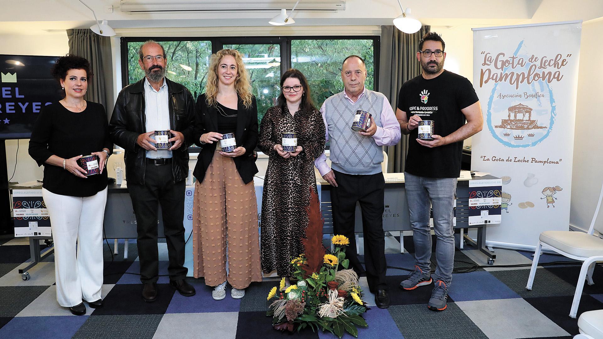 Representantes de La Gota de Leche, Hope & Progress y Concapa Navarra, en la presentación