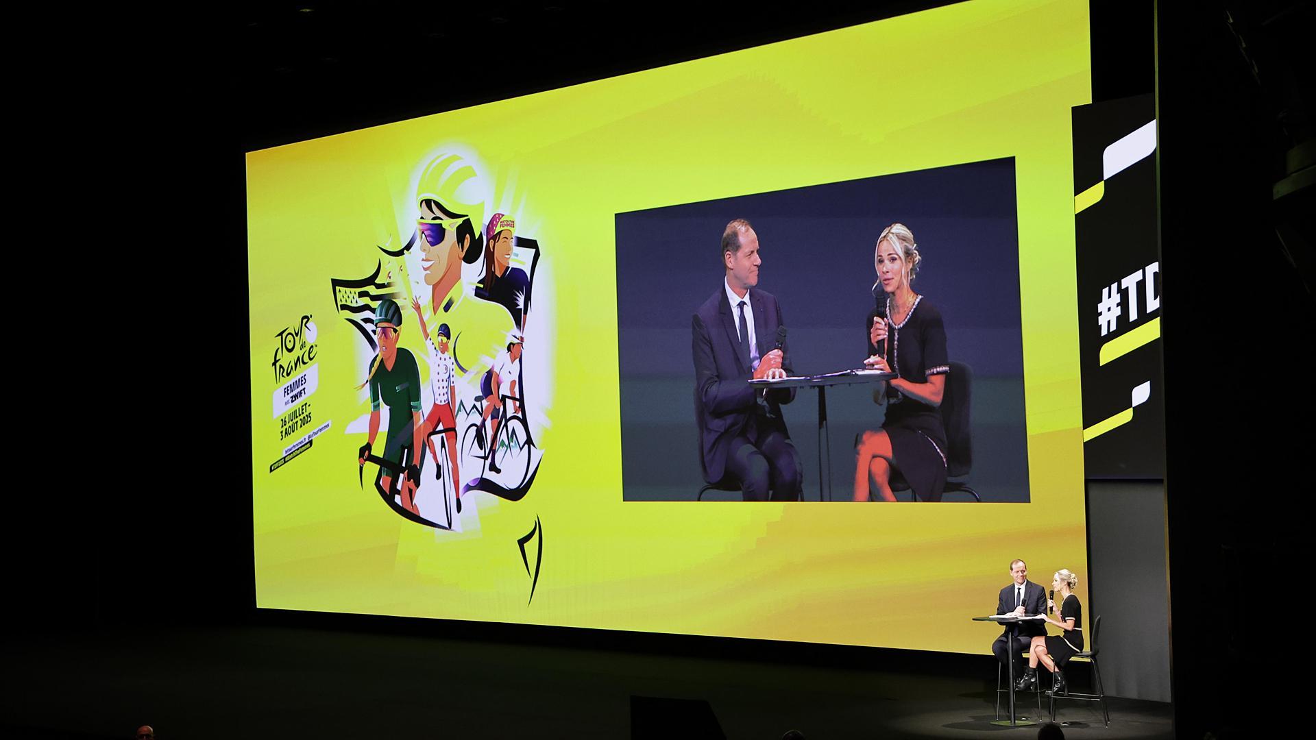 El director general del Tour, Christian Prudhommey la directora de la ronda femenina, Marion Rousse, durante la presentación de la ronda gala para 2025