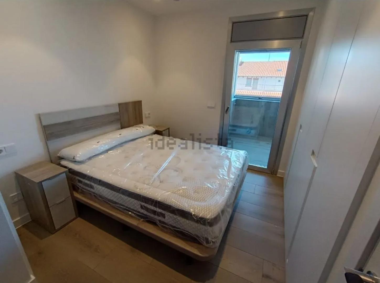 Dormitorio con acceso a la terraza