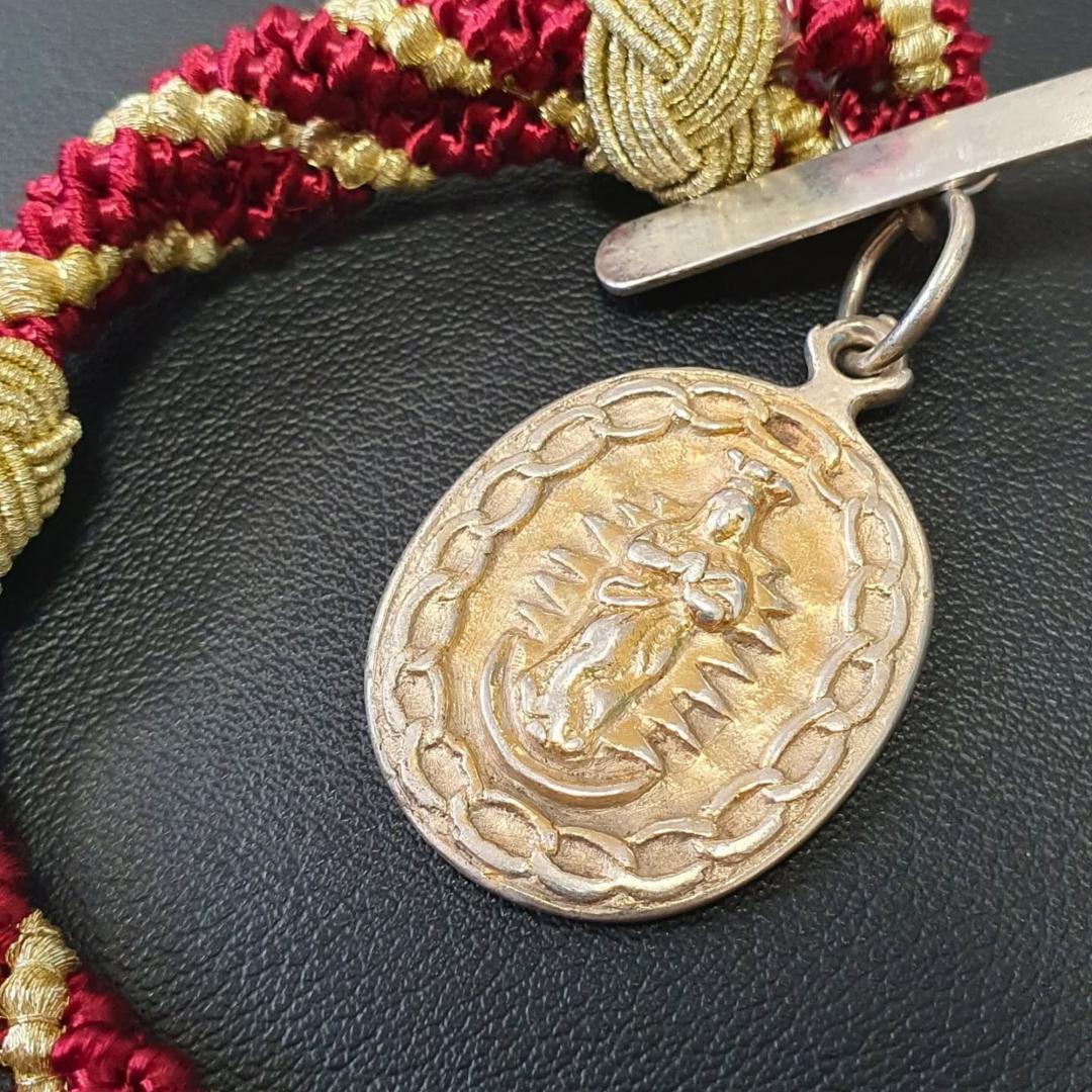 Reverso de la medalla sangüesina, dedicado a la Inmaculada