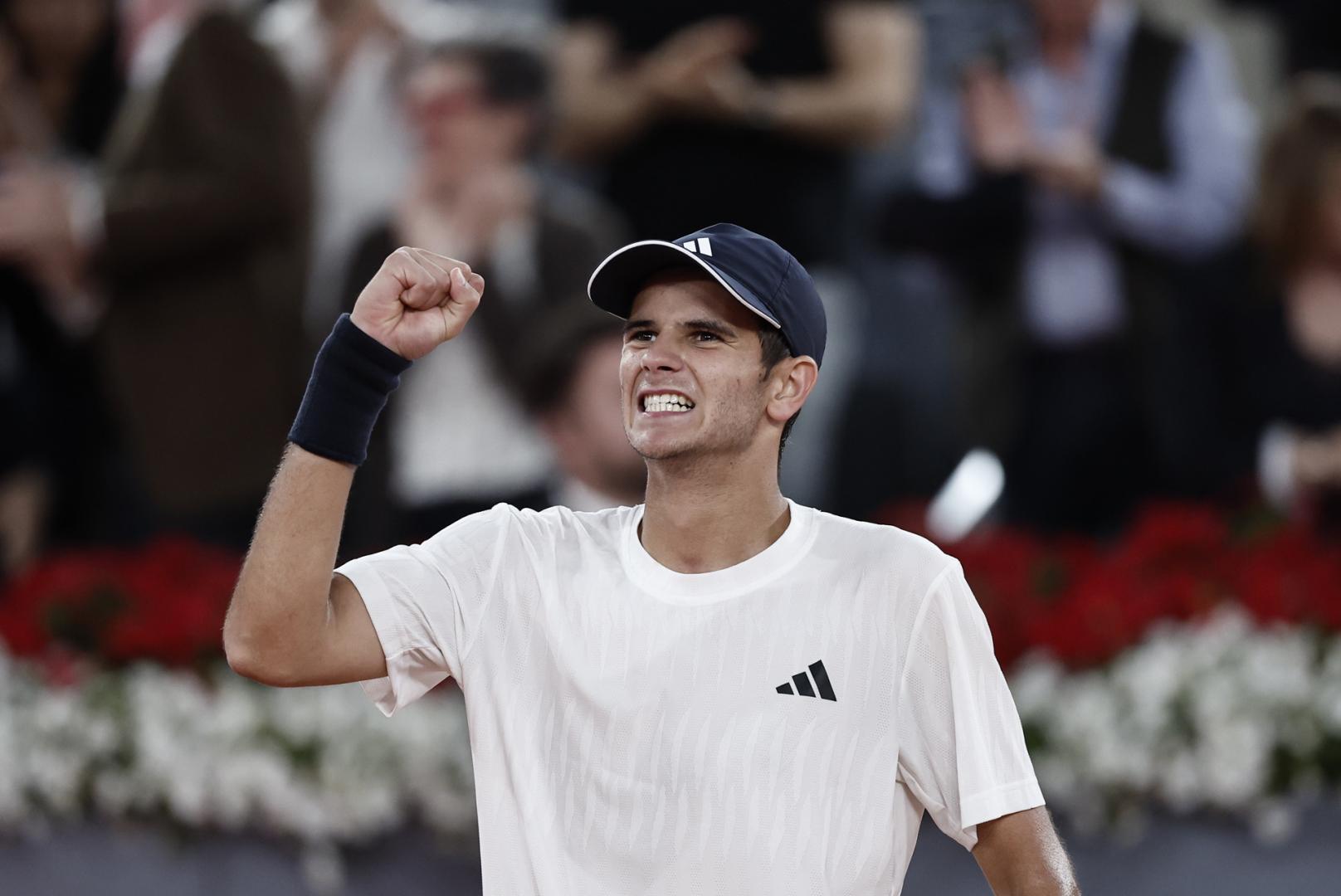 Rafa Jódar celebra su victoria frente al australiano Alex de Miñaur en el Mutua Madrid Open