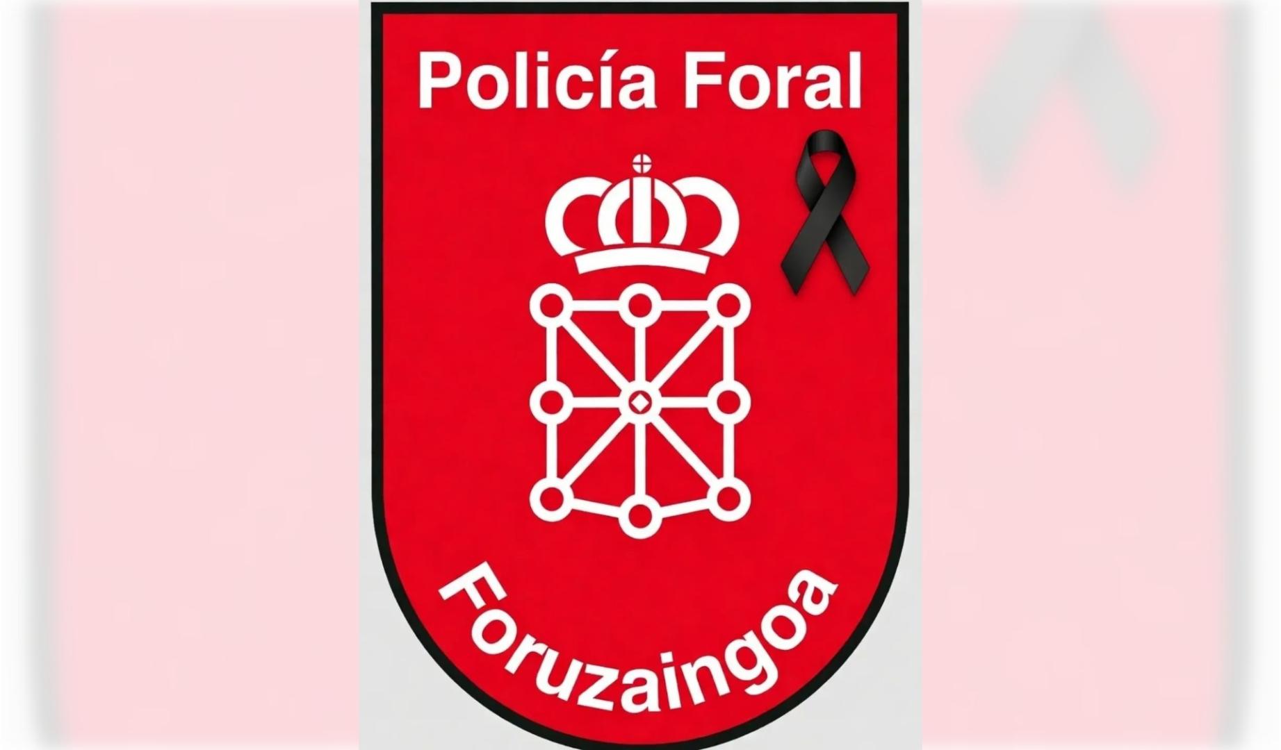 El escudo de la Policía Foral, con el crespón negro
