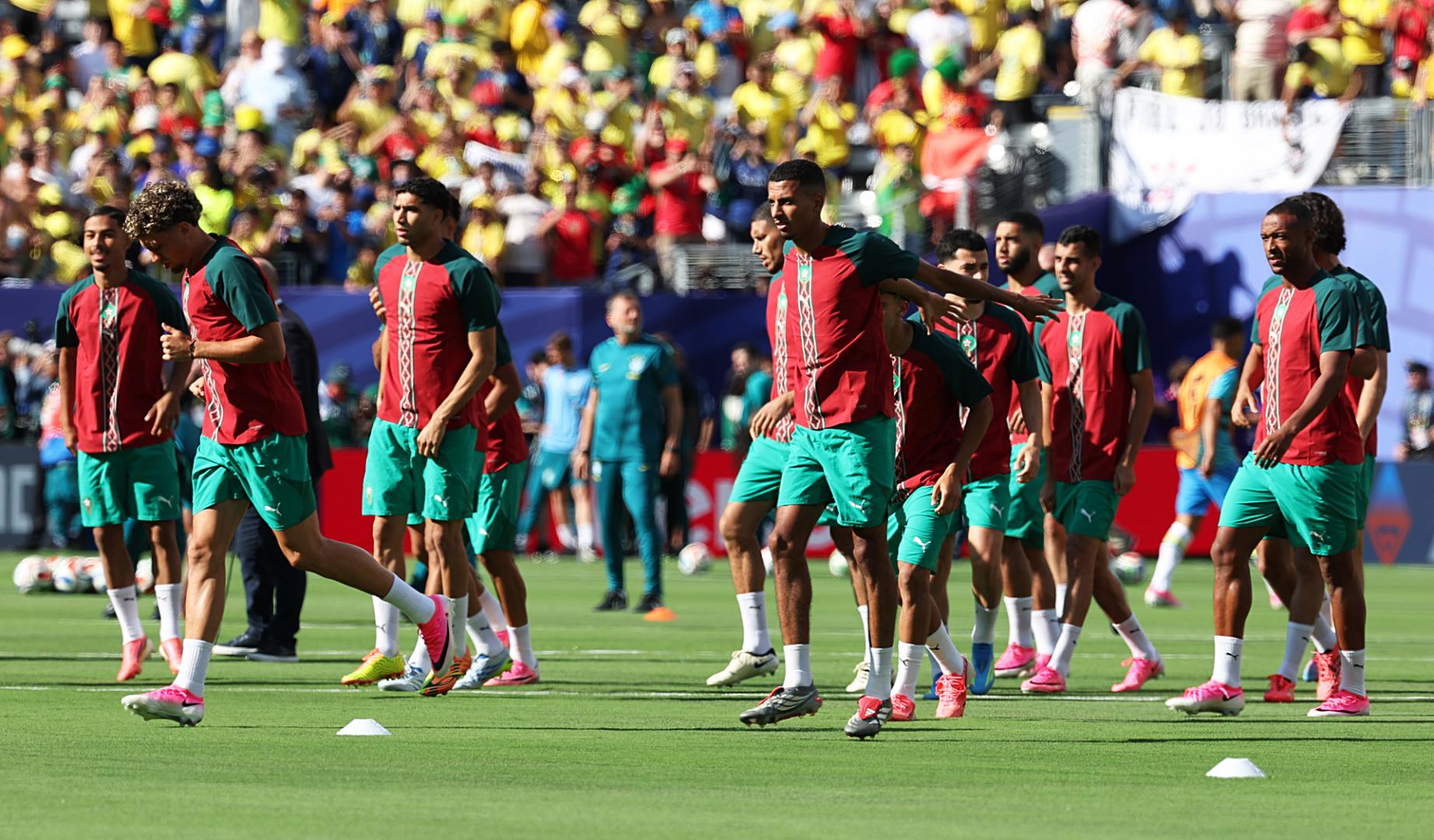 Jugadores de Marruecos calientan antes del partido del grupo C del Mundial de la FIFA 2026 contra Brasil