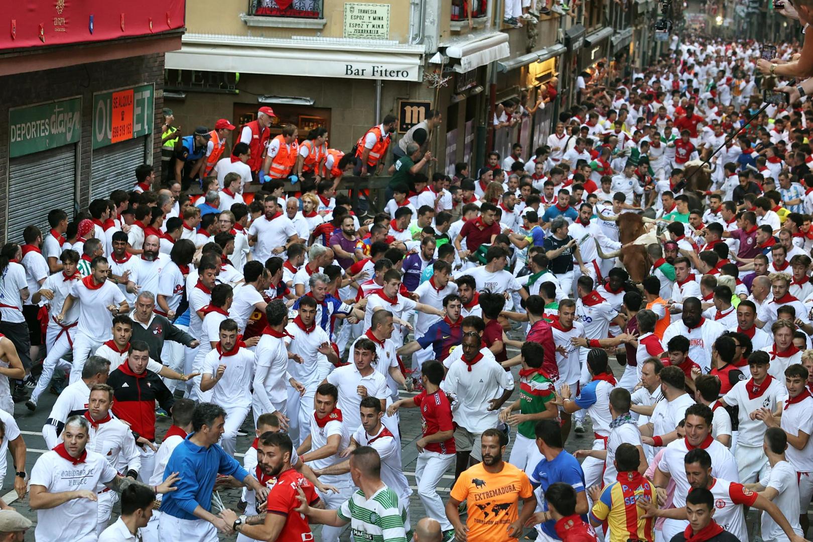 Fotos del octavo encierro de San Fermín 2026 con toros de la ganadería de Jandilla en la calle Estafeta.