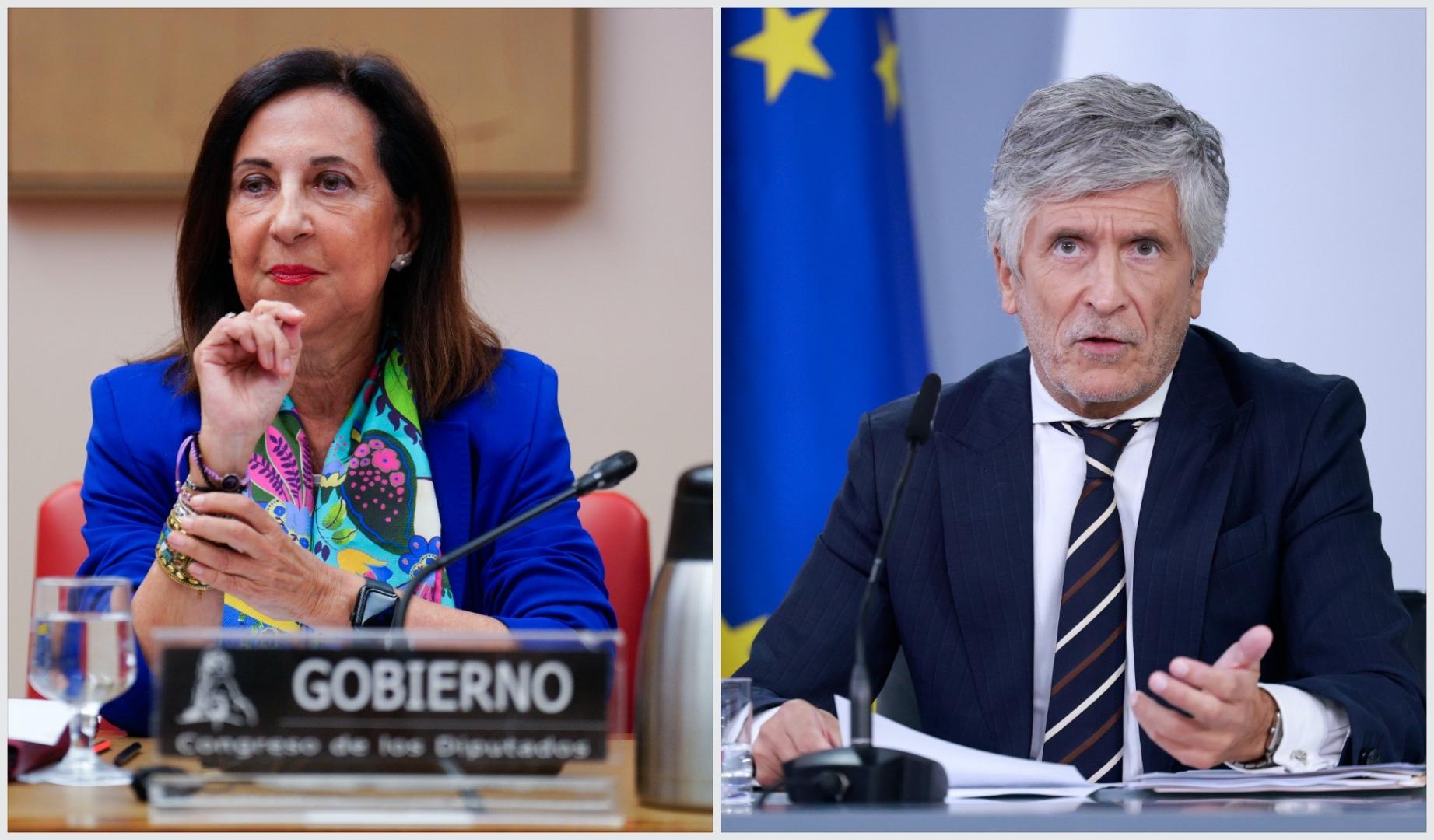 Margarita Robles y Fernando Grande-Marlaska, en sus comparecencias este 25 de agosto