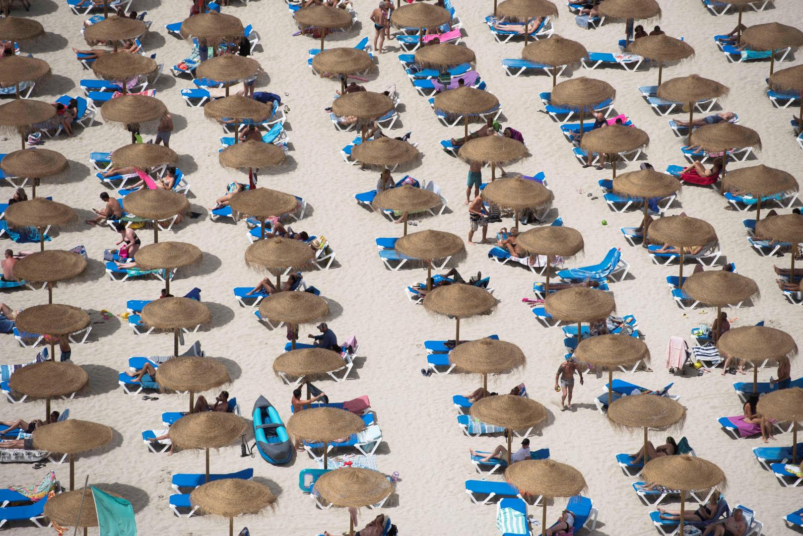 Imagen de la playa de la Cala En Porter, en Menorca, un destino que atrae a muchos navarros