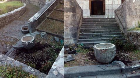 Rompen una pila bautismal y una jardinera en la iglesia de Leitza Rompen una pila bautismal y una jardinera en la iglesia de Leitza