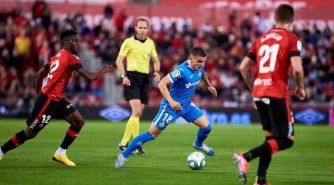 El Getafe sigue mirando a la 'Champions' y hunde al Mallorca El Getafe sigue mirando a la 'Champions' y hunde al Mallorca