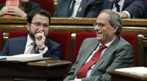 El presidente de la Generalitat, Quim Torra,y su vicepresidente, Pere Aragonés, durante el pleno del Parlament de Cataluña. El presidente de la Generalitat, Quim Torra,y su vicepresidente, Pere Aragonés, durante el pleno del Parlament de Cataluña.